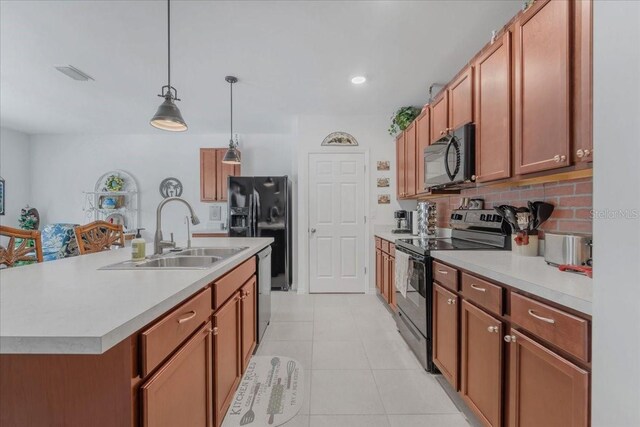 7652 Mikasa Dr, Punta Gorda, FL 33950 - kitchen with black appliances, a sink, light countertops, tasteful backsplash, and recessed lighting