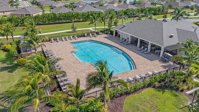 7652 Mikasa Dr, Punta Gorda, FL 33950 - community pool featuring a patio area and a residential view