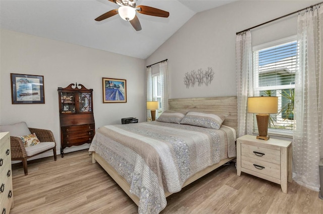 24358 Folkstone Ave, Punta Gorda, FL 33980 - bedroom with light wood-style flooring, multiple windows, lofted ceiling, and a ceiling fan