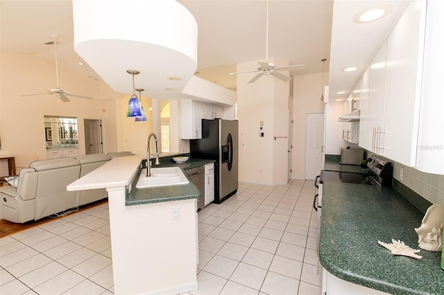 3506 Saint Florent Ct, Punta Gorda, FL 33950 - kitchen with ceiling fan, a peninsula, appliances with stainless steel finishes, open floor plan, and recessed lighting