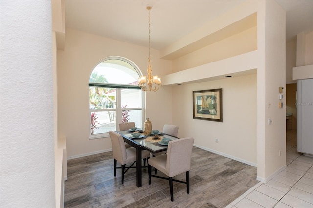 3506 Saint Florent Ct, Punta Gorda, FL 33950 - dining space featuring a chandelier and light wood-type flooring