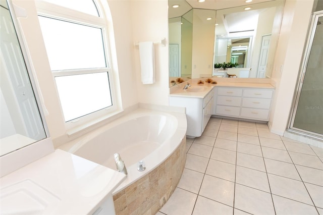 3506 Saint Florent Ct, Punta Gorda, FL 33950 - bathroom with vanity, a bath, tile patterned floors, and a stall shower