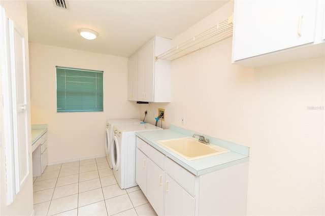 3506 Saint Florent Ct, Punta Gorda, FL 33950 - laundry room featuring cabinet space, independent washer and dryer, and light tile patterned floors