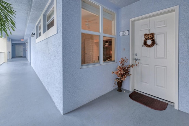 2001 Bal Harbor Blvd Unit 2306, Punta Gorda, FL 33950 - view of exterior entry with stucco siding
