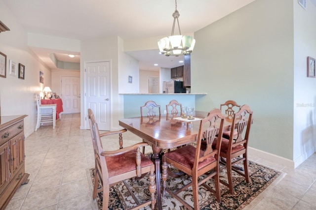 2001 Bal Harbor Blvd Unit 2306, Punta Gorda, FL 33950 - dining area with a chandelier and light tile patterned flooring