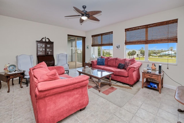 2001 Bal Harbor Blvd Unit 2306, Punta Gorda, FL 33950 - living area with healthy amount of natural light, a ceiling fan, and light tile patterned flooring