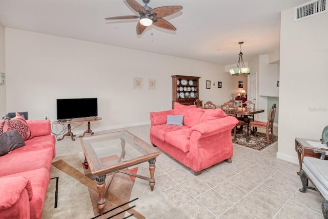 2001 Bal Harbor Blvd Unit 2306, Punta Gorda, FL 33950 - living area with a ceiling fan and baseboards