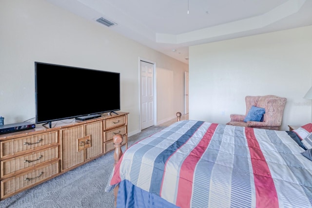 2001 Bal Harbor Blvd Unit 2306, Punta Gorda, FL 33950 - carpeted bedroom with a tray ceiling