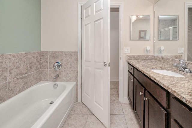 2001 Bal Harbor Blvd Unit 2306, Punta Gorda, FL 33950 - bathroom with a bath, vanity, and tile patterned floors