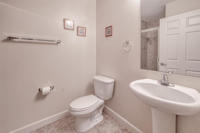2001 Bal Harbor Blvd Unit 2306, Punta Gorda, FL 33950 - bathroom with tiled shower and tile patterned floors