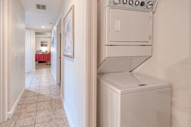 2001 Bal Harbor Blvd Unit 2306, Punta Gorda, FL 33950 - laundry area with stacked washer / drying machine, light tile patterned flooring, and recessed lighting