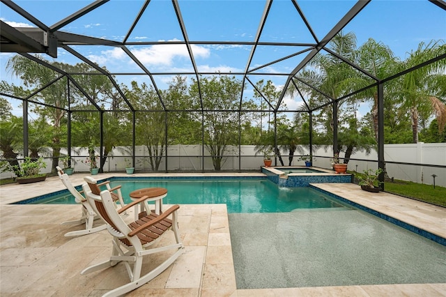 2515 Sherman Oak Dr, North Port, FL 34289 - view of pool featuring a patio area, a fenced backyard, a pool with connected hot tub, and a lanai