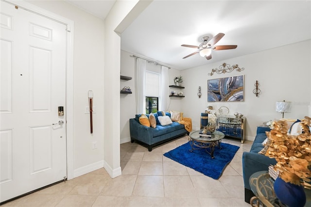 2515 Sherman Oak Dr, North Port, FL 34289 - living area featuring ceiling fan, light tile patterned flooring, and baseboards