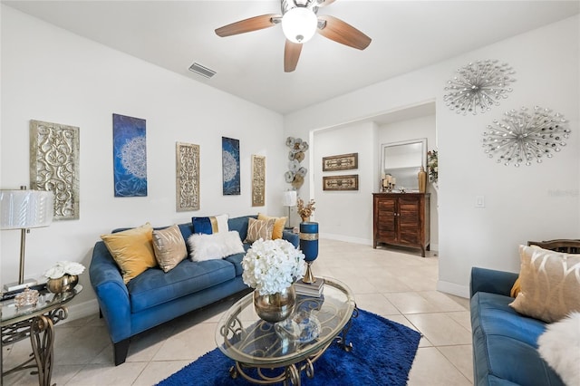 2515 Sherman Oak Dr, North Port, FL 34289 - living area featuring light tile patterned floors, a ceiling fan, and baseboards
