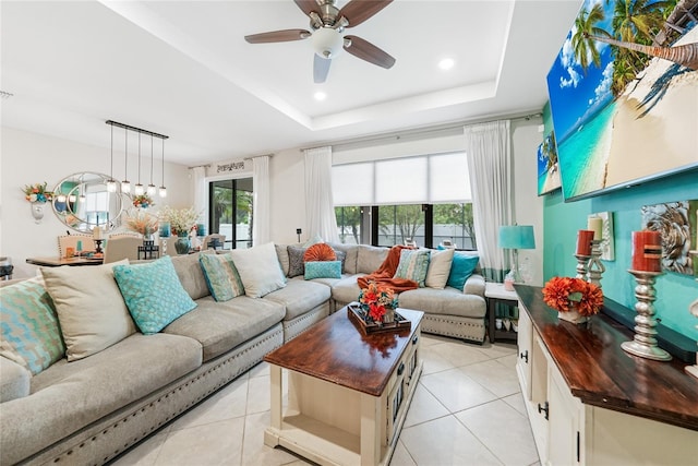 2515 Sherman Oak Dr, North Port, FL 34289 - living room featuring ceiling fan, light tile patterned flooring, a raised ceiling, and recessed lighting