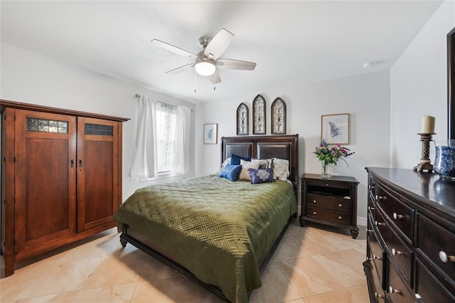 2515 Sherman Oak Dr, North Port, FL 34289 - bedroom with light tile patterned floors and a ceiling fan