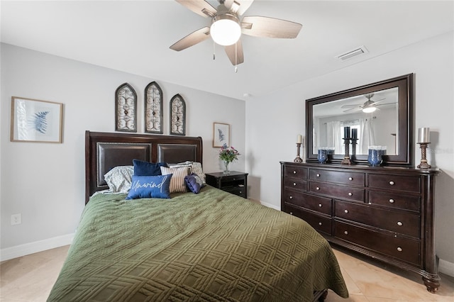 2515 Sherman Oak Dr, North Port, FL 34289 - bedroom with baseboards, ceiling fan, and light tile patterned floors
