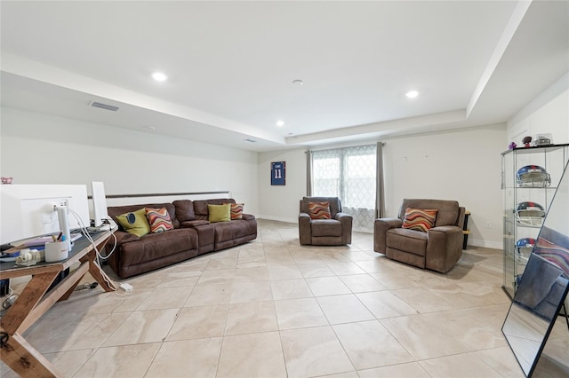 2515 Sherman Oak Dr, North Port, FL 34289 - living room with a tray ceiling, recessed lighting, baseboards, and light tile patterned flooring