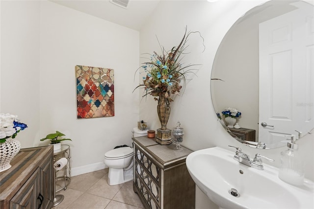 2515 Sherman Oak Dr, North Port, FL 34289 - bathroom with a sink, tile patterned flooring, and toilet