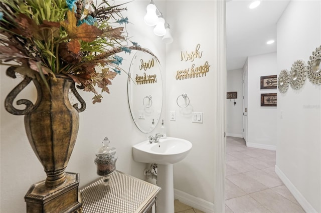 2515 Sherman Oak Dr, North Port, FL 34289 - bathroom with tile patterned flooring, recessed lighting, baseboards, and a sink