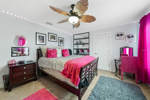 2515 Sherman Oak Dr, North Port, FL 34289 - tiled bedroom with a ceiling fan