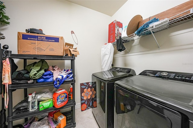 2515 Sherman Oak Dr, North Port, FL 34289 - washroom with separate washer and dryer and light tile patterned flooring