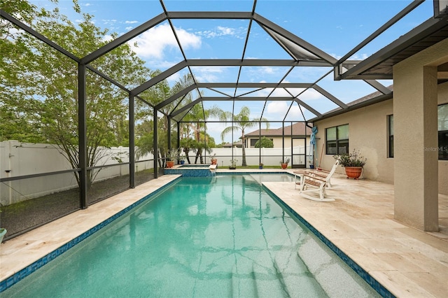 2515 Sherman Oak Dr, North Port, FL 34289 - view of swimming pool with a fenced backyard, a patio, a pool with connected hot tub, and a lanai