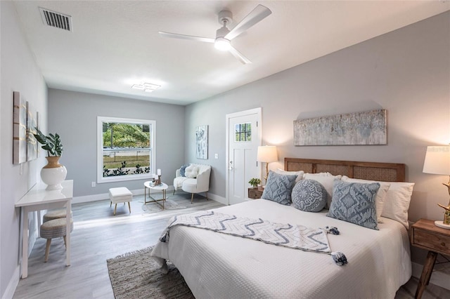 12168 Mayfair Ave, Port Charlotte, FL 33981 - bedroom featuring wood finished floors and ceiling fan