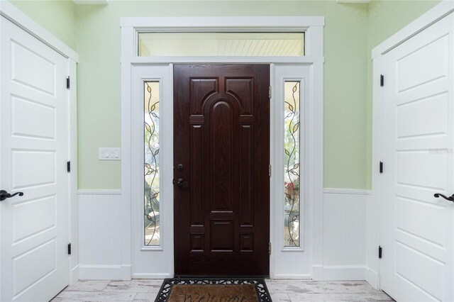 13204 Kakapo Ave, Port Charlotte, FL 33981 - entrance foyer with wainscoting and baseboards