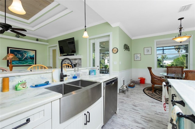 13204 Kakapo Ave, Port Charlotte, FL 33981 - kitchen featuring dishwasher, crown molding, a sink, light wood-type flooring, and ceiling fan