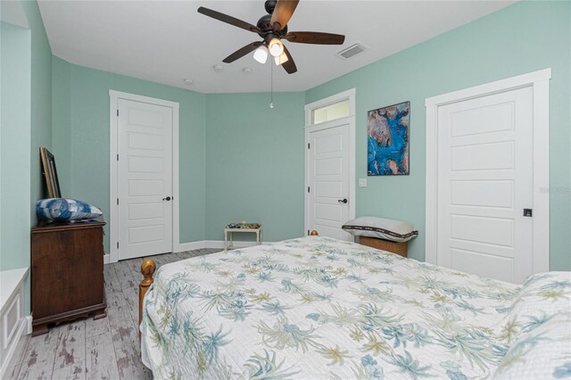 13204 Kakapo Ave, Port Charlotte, FL 33981 - bedroom featuring light wood finished floors, ceiling fan, baseboards, and a closet