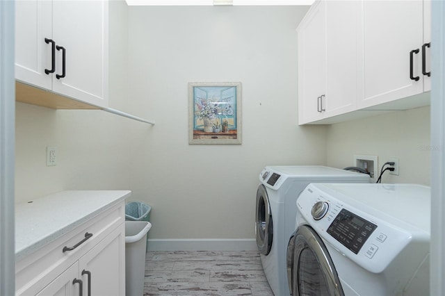 13204 Kakapo Ave, Port Charlotte, FL 33981 - laundry room featuring cabinet space, washing machine and clothes dryer, and baseboards