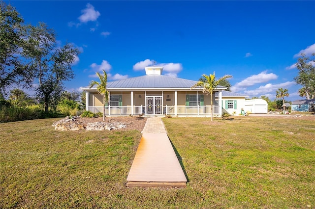 13204 Kakapo Ave, Port Charlotte, FL 33981 - view of front facade featuring a porch, a front yard, and metal roof
