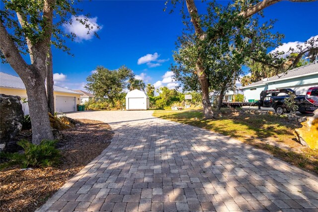 13204 Kakapo Ave, Port Charlotte, FL 33981 - view of yard with decorative driveway