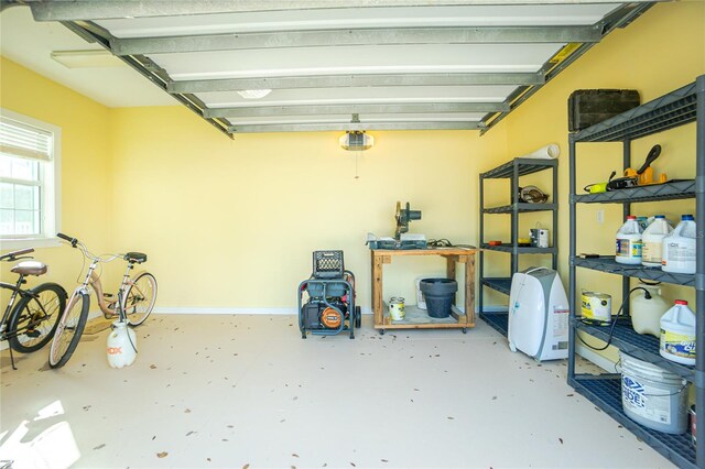 13204 Kakapo Ave, Port Charlotte, FL 33981 - garage featuring a garage door opener