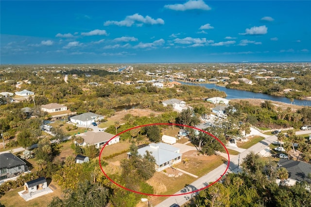 13204 Kakapo Ave, Port Charlotte, FL 33981 - aerial perspective of suburban area with a large body of water