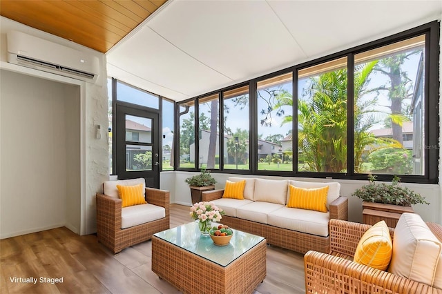 4346 Rayfield Dr Unit 4346, Sarasota, FL 34243 - sunroom featuring a wall mounted air conditioner and wood finished floors
