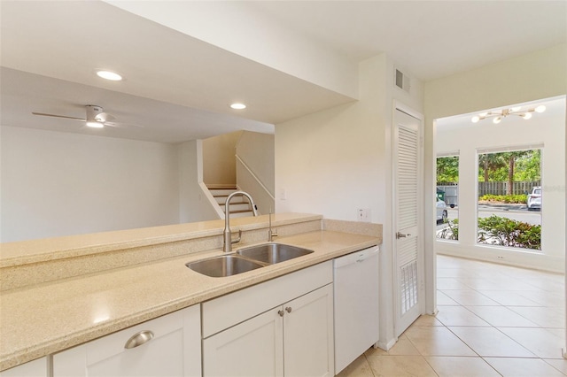 4346 Rayfield Dr Unit 4346, Sarasota, FL 34243 - kitchen featuring a sink, dishwasher, white cabinets, light tile patterned floors, and ceiling fan