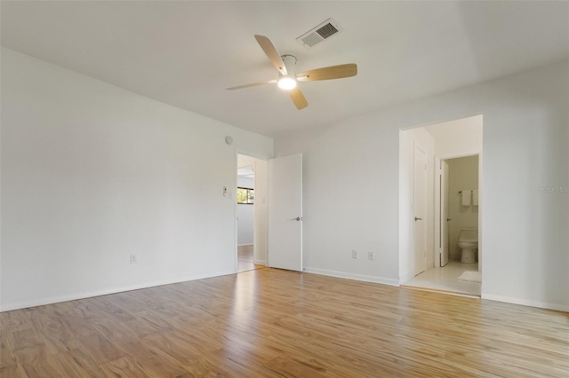 4346 Rayfield Dr Unit 4346, Sarasota, FL 34243 - spare room featuring a ceiling fan, light wood-style floors, and baseboards