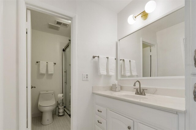 4346 Rayfield Dr Unit 4346, Sarasota, FL 34243 - bathroom with vanity, a shower stall, toilet, and tile patterned flooring