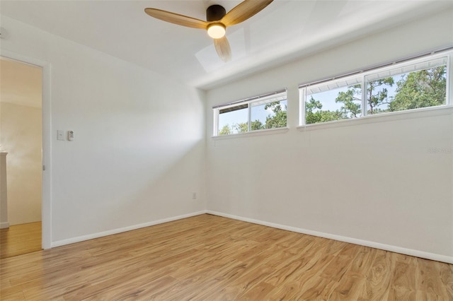 4346 Rayfield Dr Unit 4346, Sarasota, FL 34243 - unfurnished room with light wood-type flooring, baseboards, and a ceiling fan