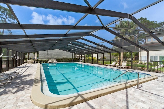 4346 Rayfield Dr Unit 4346, Sarasota, FL 34243 - community pool with a patio area and glass enclosure