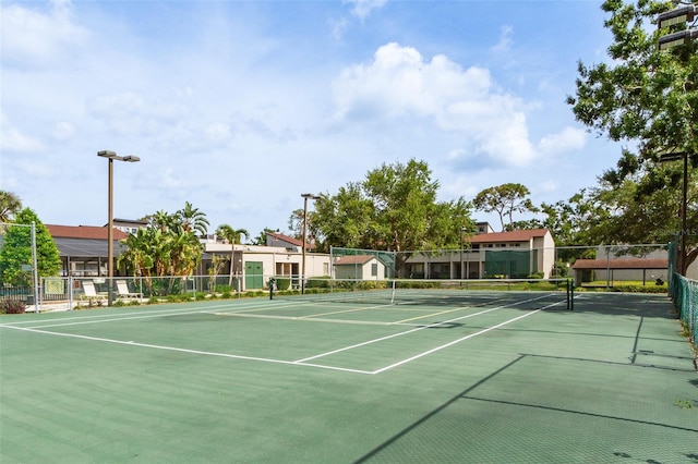 4346 Rayfield Dr Unit 4346, Sarasota, FL 34243 - view of tennis court with community basketball court