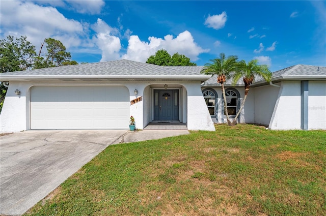 891 Bayard St, Port Charlotte, FL 33948 - single story home with an attached garage, stucco siding, driveway, and a front yard