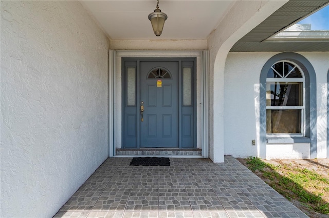 891 Bayard St, Port Charlotte, FL 33948 - property entrance featuring stucco siding
