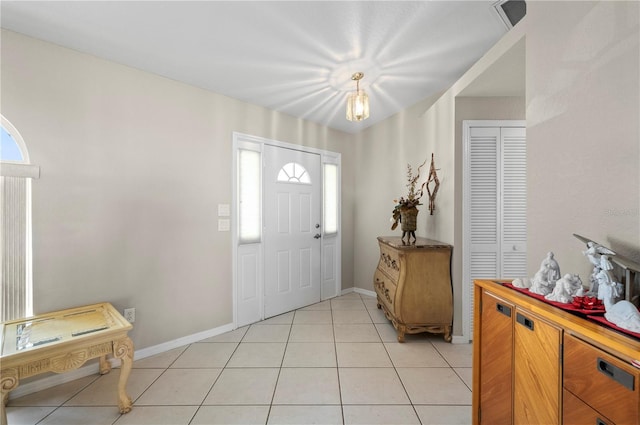 891 Bayard St, Port Charlotte, FL 33948 - entryway with light tile patterned flooring and baseboards