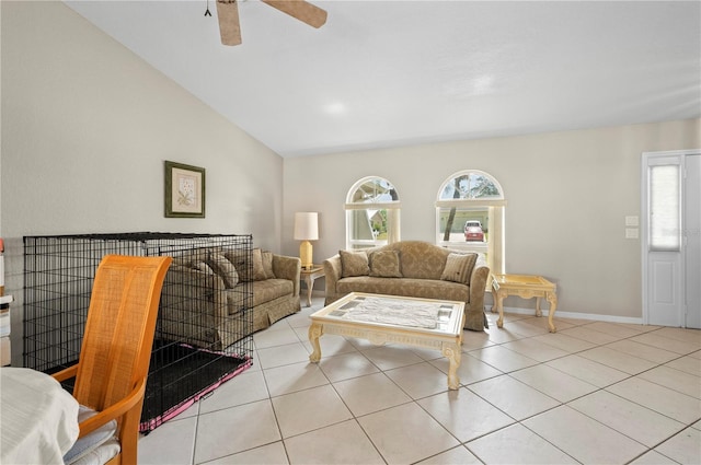 891 Bayard St, Port Charlotte, FL 33948 - living room featuring ceiling fan, lofted ceiling, light tile patterned floors, and baseboards