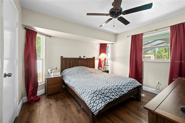 891 Bayard St, Port Charlotte, FL 33948 - bedroom featuring dark wood-style floors, baseboards, and a ceiling fan
