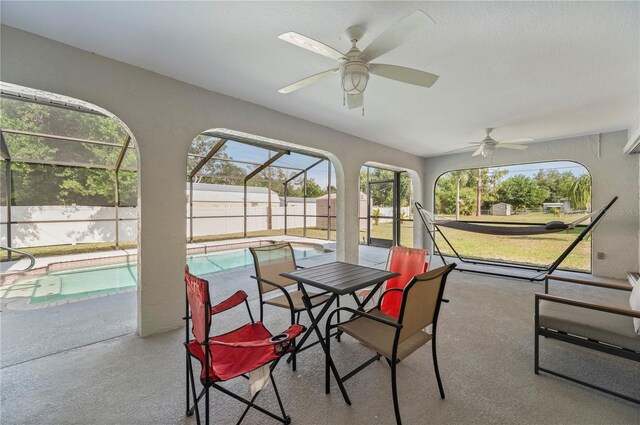 891 Bayard St, Port Charlotte, FL 33948 - sunroom / solarium featuring a ceiling fan and a swimming pool