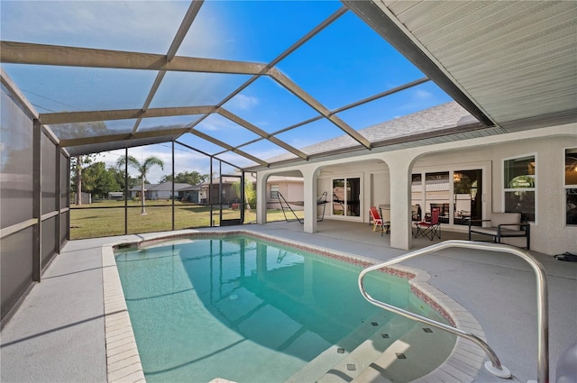 891 Bayard St, Port Charlotte, FL 33948 - swimming pool with a patio, a lawn, and glass enclosure